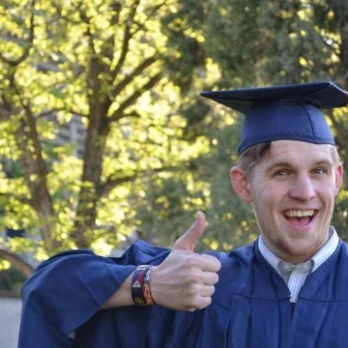 Student in a graduating hat and gown